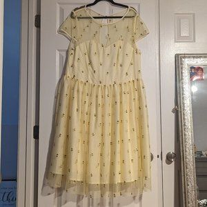 Yellow flowered dress, knee length, cap sleeves